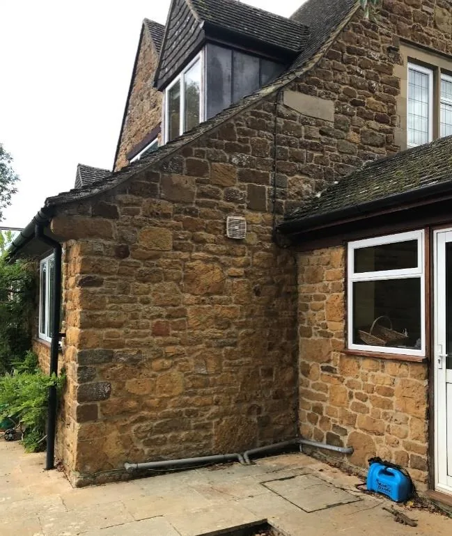 The east kitchen wall of Orchard House, the planned location for the air-source heat pump